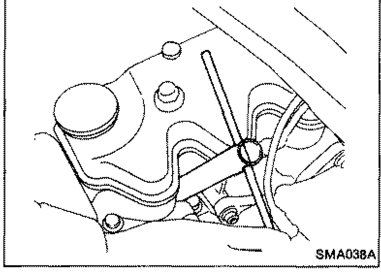 Engine illustration showing removal of spark plugs with a spark plug wrench.