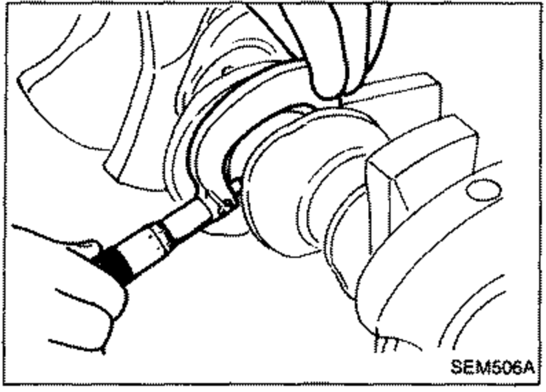 A micrometer measuring the outer diameter 'Dm' of a crankshaft main journal.