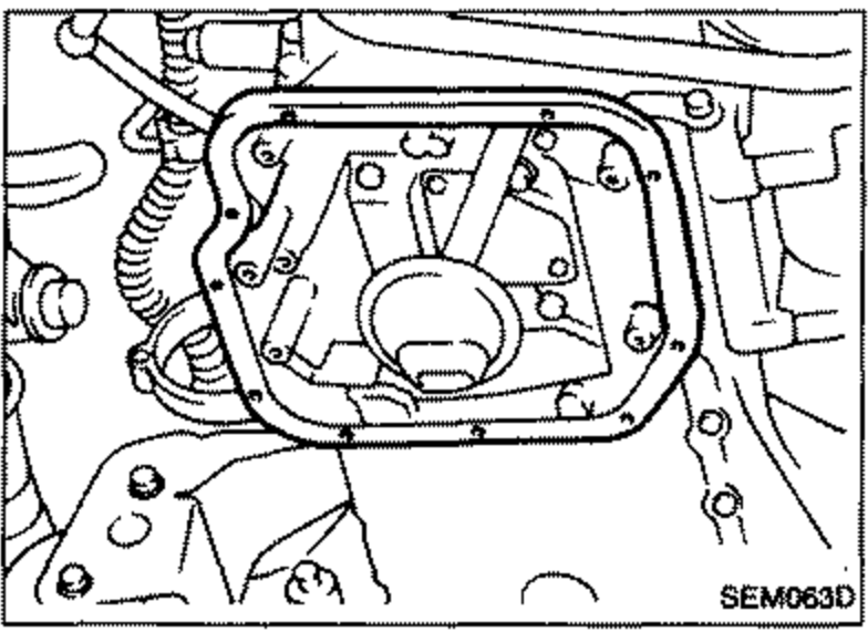 Steel oil pan being removed from the engine, viewed from below.