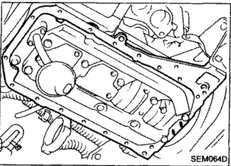 Aluminum oil pan being removed from the cylinder block, viewed from below showing the mating surface.