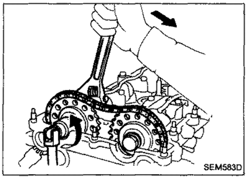 Illustration of camshaft sprockets being removed, with a tool/lever and downward arrow shown at the top.