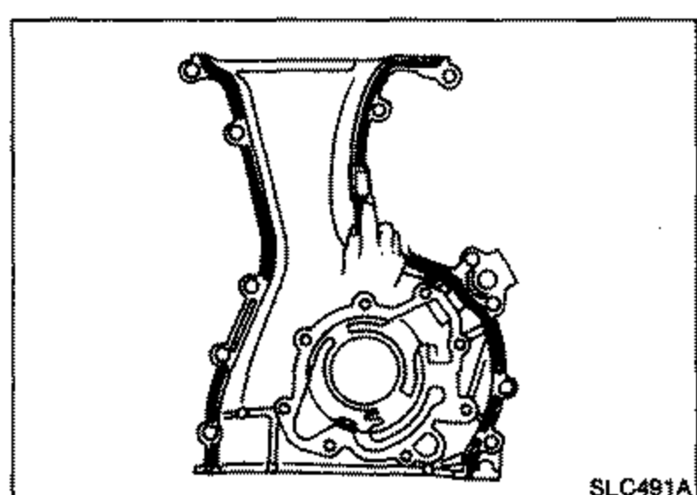 Front cover mating surface, showing where to remove all traces of liquid gasket using a scraper.