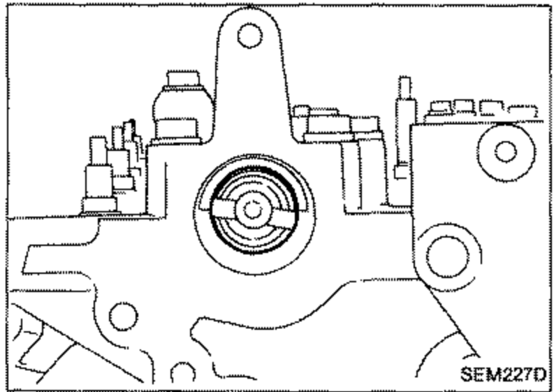 Front of engine / distributor mounting area showing the camshaft/distributor drive position with the rotor centered. Illustrates the correct camshaft position before installing the distributor.