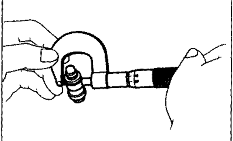 Illustration showing a micrometer measuring the outer diameter of a hydraulic lash adjuster held by hand.