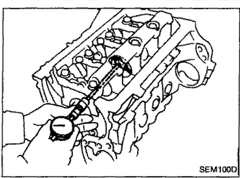 View of the cylinder block with main bearing caps and main bearing beam installed.