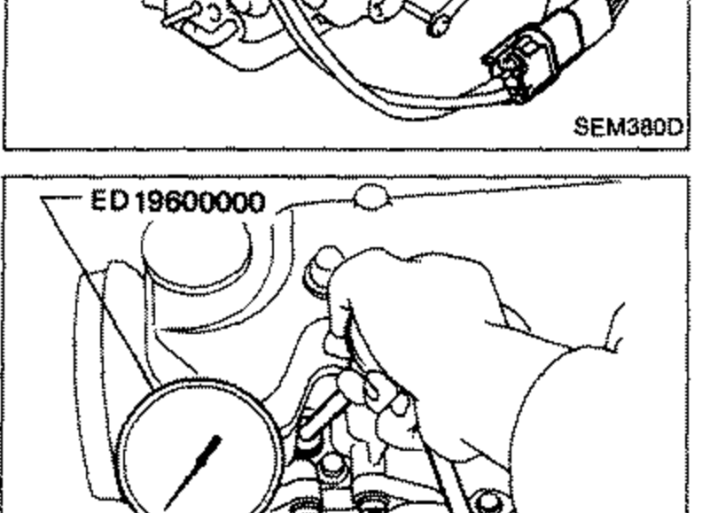 A compression tester (dial gauge) attached to the No. 1 cylinder spark plug hole. Labeled 'ED19600000'.