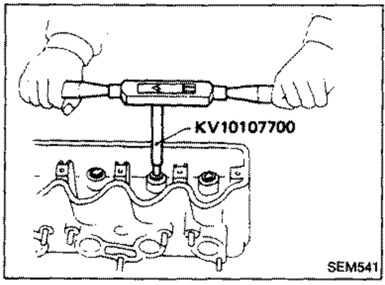 Reaming the valve guide at room temperature using Tool KV10107700 (reamer) through the cylinder head.