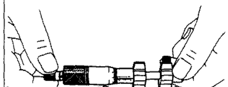 Hand using a bore gauge to check the inner diameter of a rocker arm.