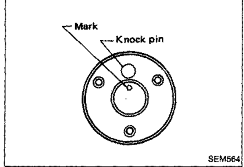 End view of camshaft showing the mark and knock pin orientation, with the knock pin set to the upper side.