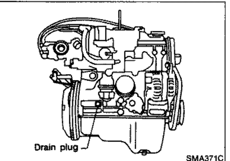 View of the engine/radiator area showing the drain plug location for draining engine coolant.