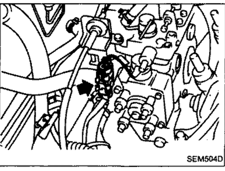 Photo of the engine showing the fuel-cut solenoid valve connector being disconnected.