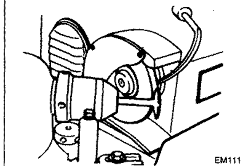 Valve grinder refacing a valve face / valve stem end surface.
