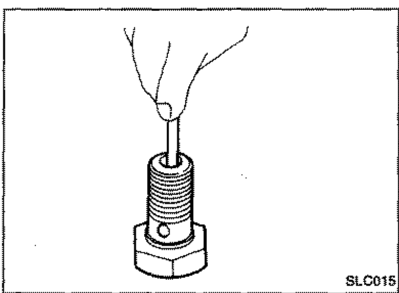 Cross-section line drawing of an oil jet for the piston showing the cut-off valve and inlet.