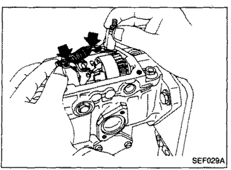 Pump with the control shaft being removed from the tension lever; a black arrow indicates the control shaft.