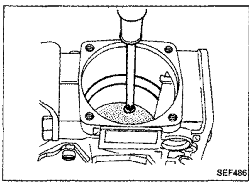 Screw being loosened from the feed pump cover using a screwdriver, top-down view of the cover with four corner screws.