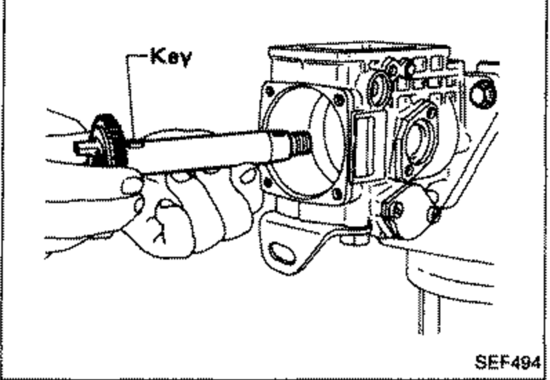 Drive shaft being installed into the pump housing so the key in the drive shaft engages the key groove in the rotor. Callout labels 'Key'.