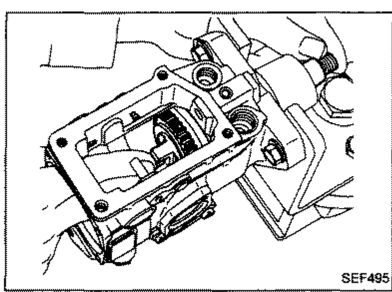Top view of the pump body showing the drive shaft's nail set parallel to the timer.