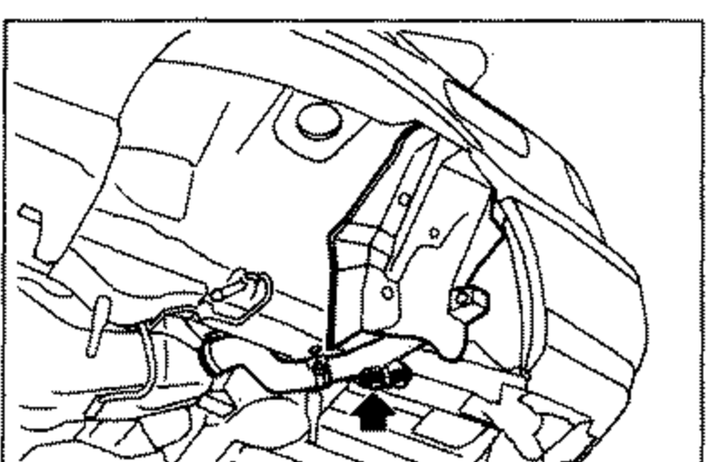 Underbody/luggage area view showing the filler protector and filler tube being removed.